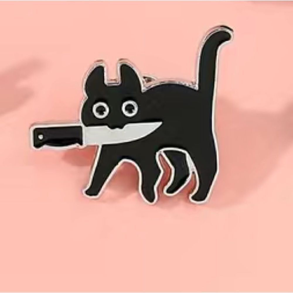 Black cat with knife enamel pin